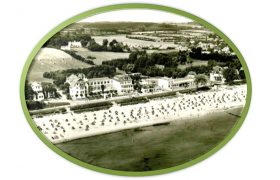 Historisches Bild eines Seebades im ovalen grünen Rahmen