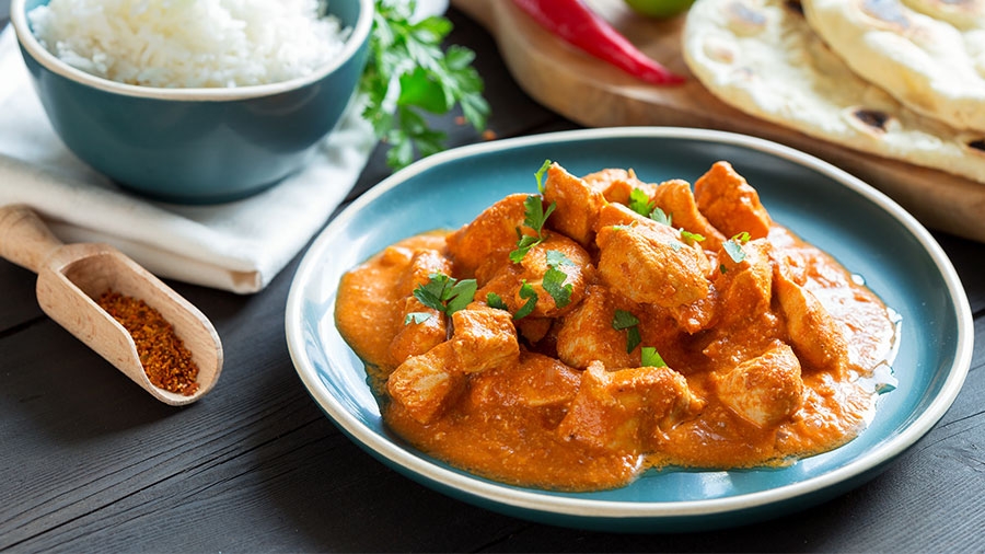 Butter Chicken zubereitet auf dem Teller